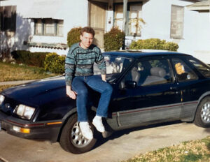 Christopher Simmons, with Mindset company car, 1988